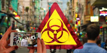 אזהרה מפני נגיף הקורונה בטלפון של אפל. איור: Image by Gerd Altmann from Pixabay